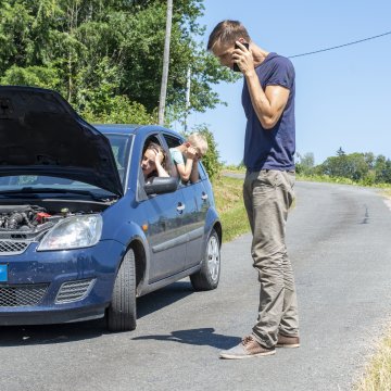manufacturer wrap protection extended car warranty usaa car breakdown family with kids on the side of the road man on the phone